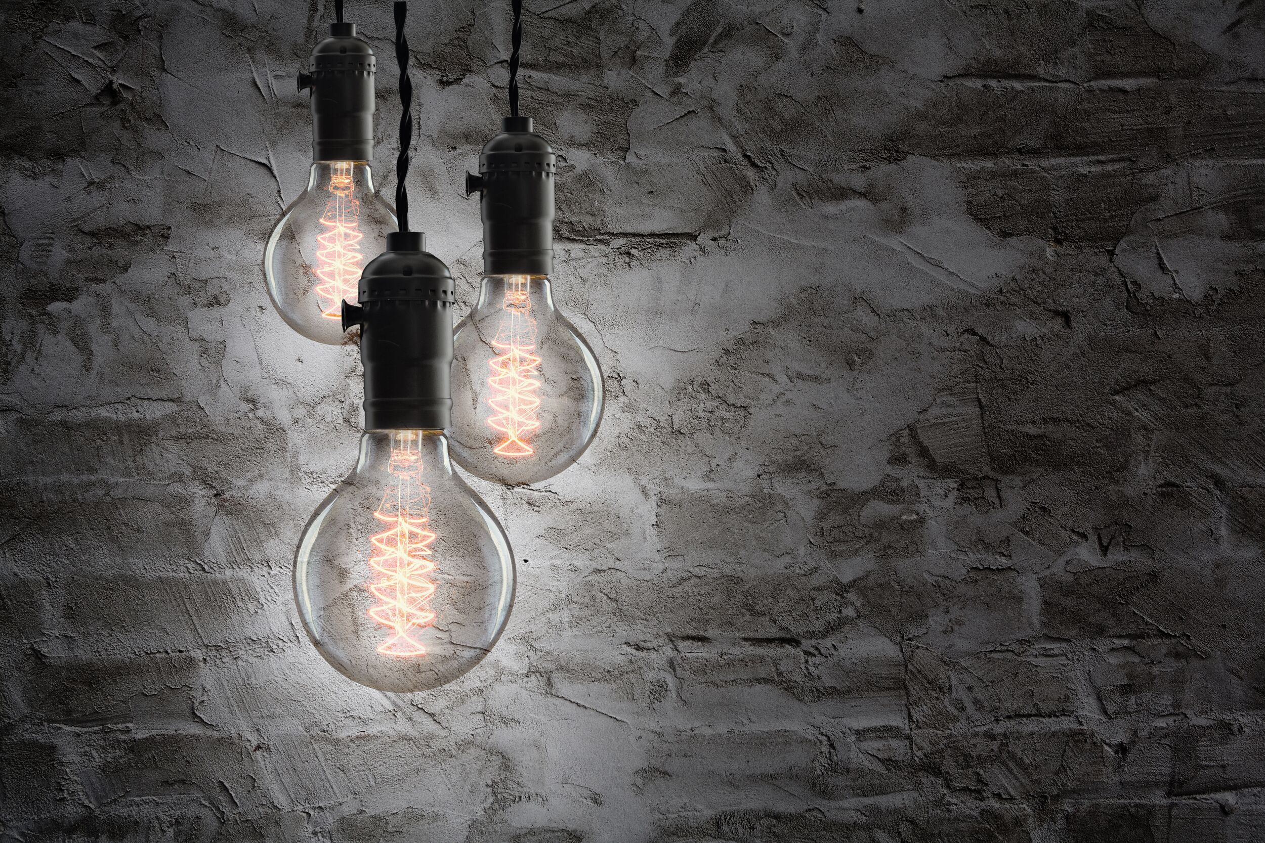 Edison bulbs on a brick background.